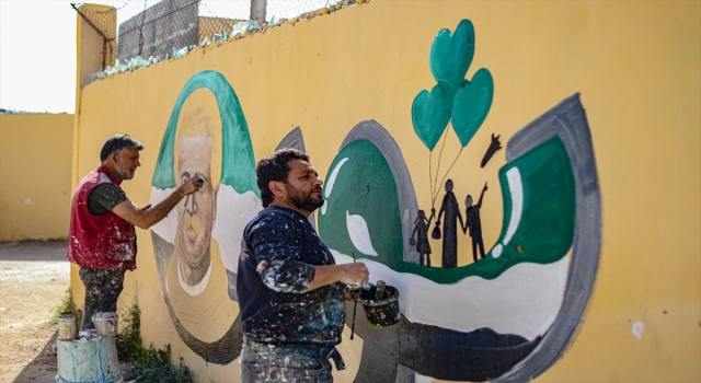 İdlib’de, uzaya giden ilk Suriyeli kozmonot Faris’in anısına okul duvarına grafiti çizildi